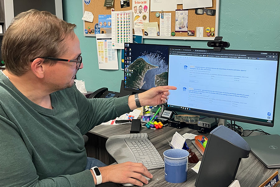 Mr. Harris showing resources on the computer